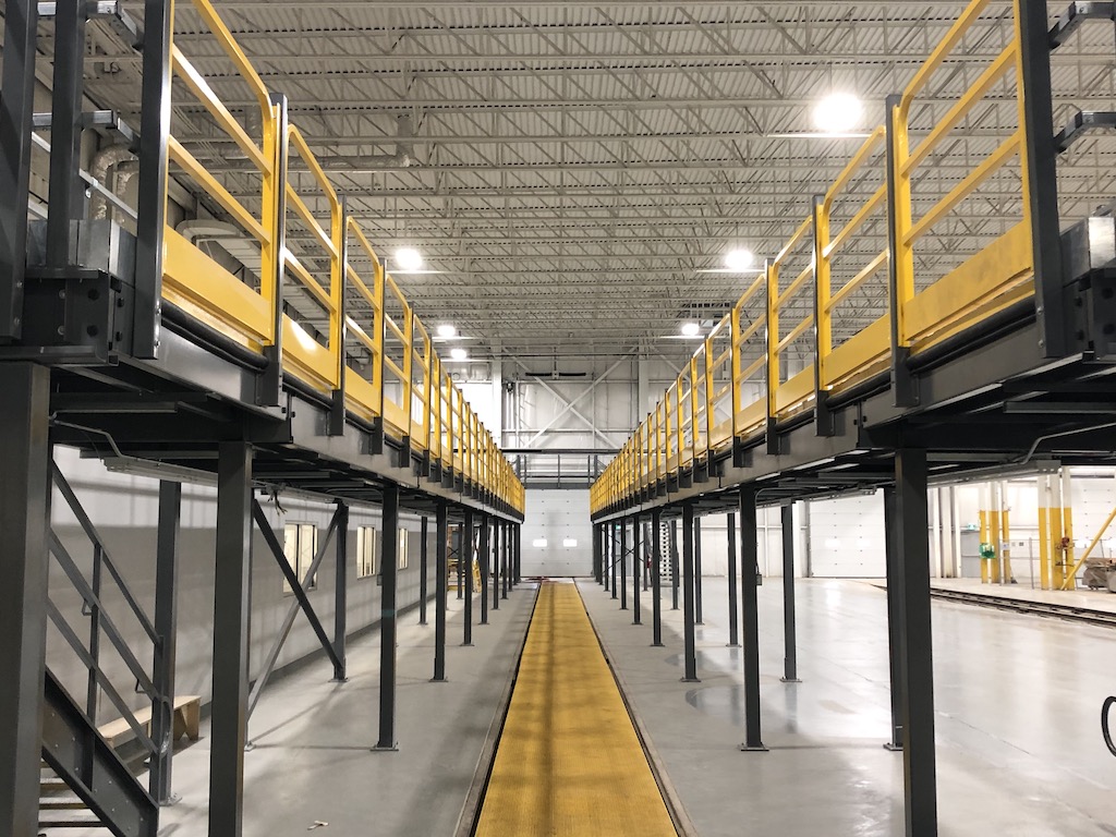 Center photo of Elevated Train Platform Mezzanine Structures with removeable handrail