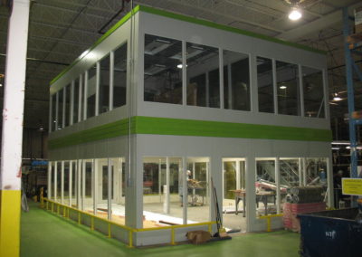 Two Tier Modular office structure with full size windows, green trim