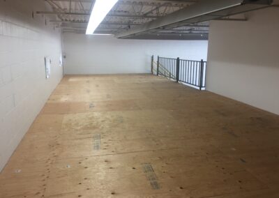 Used Mezzanine Modification and Installation with Plywood Flooring