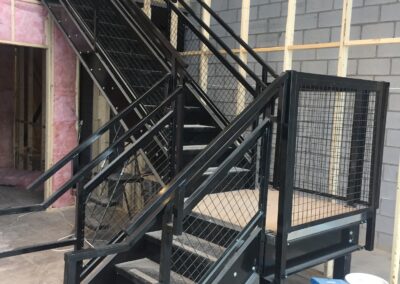 Black Staircase for Mezzanine Platform - Hamilton, Ontario Canada